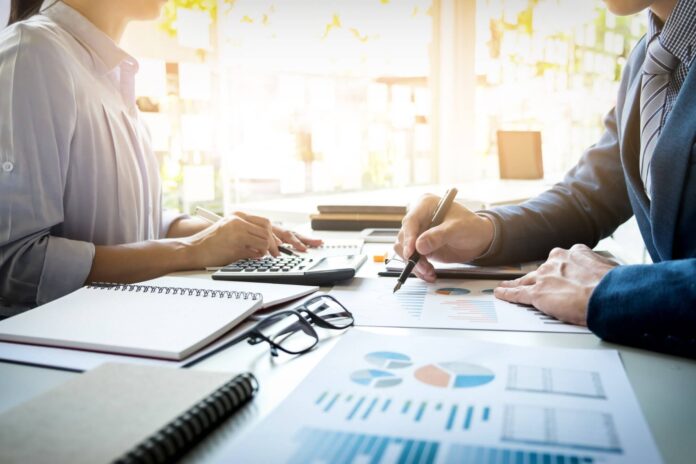 business-man-financial-inspector-secretary-making-report-calculating-checking-balance-internal-revenue-service-inspector-checking-document-audit-concept.jpg FREEPIK